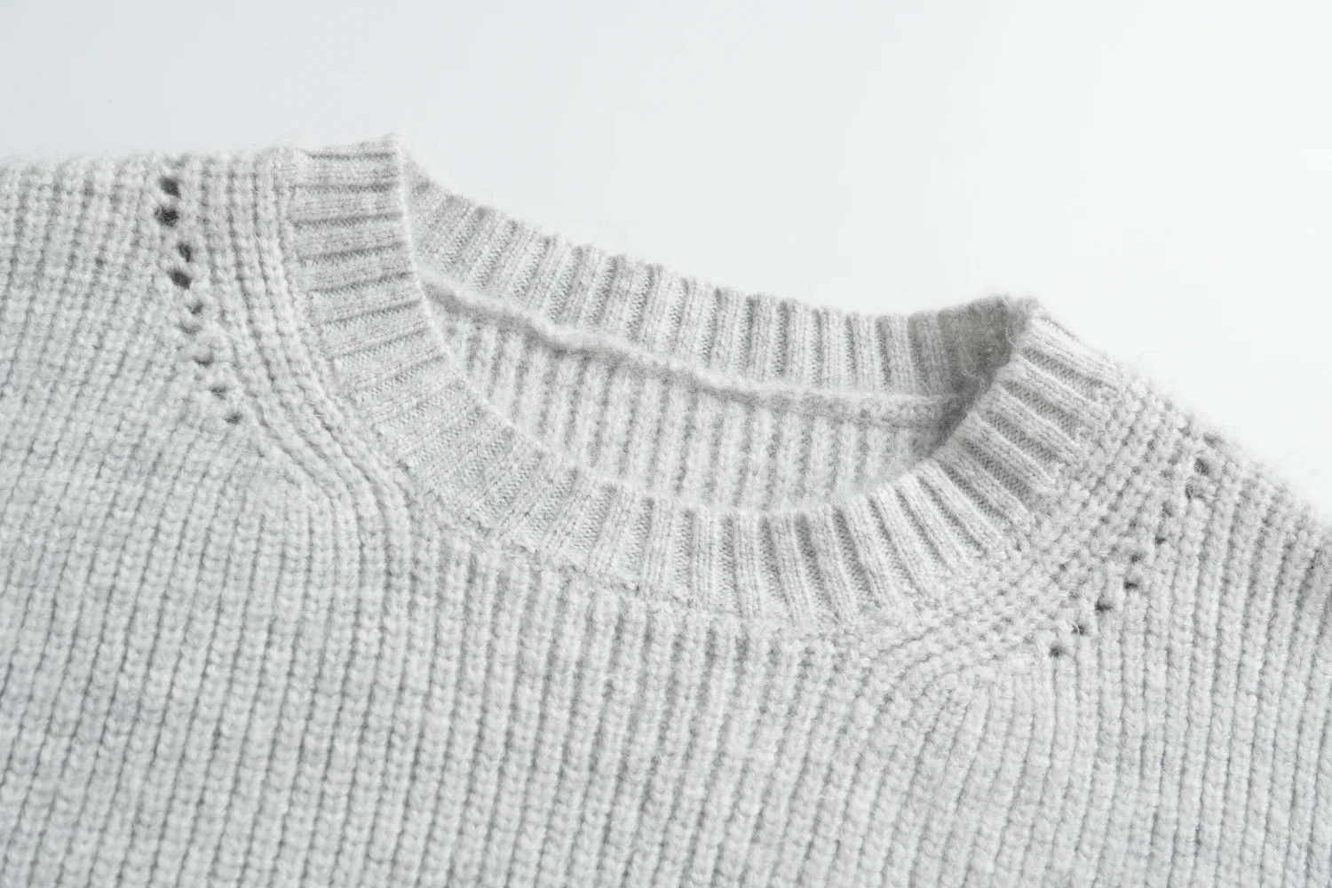 light grey pointelle sweater