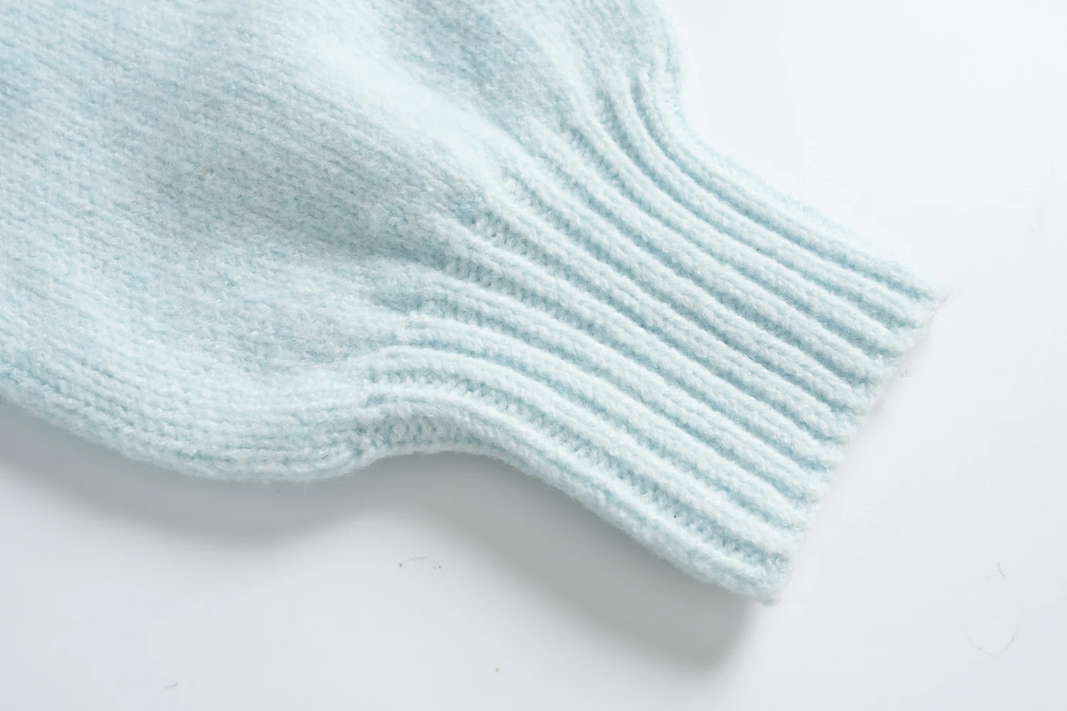 light blue cable knit sweater