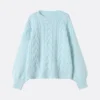 light blue cable knit sweater
